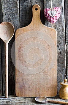Old retro empty cutting board with heart love cooking food background concept