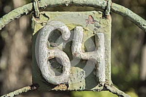 Old retro iron plate number 64