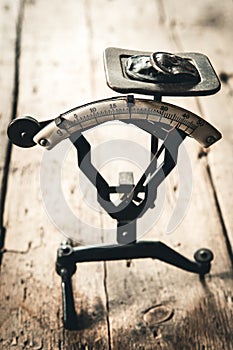 old retro letter scale on a wooden table