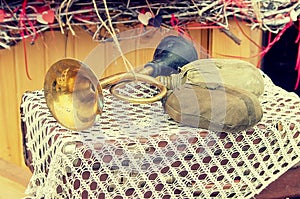 Old retro objects antique Military klaxon horn sound and hiking water bottles, vintage image retro style effect.