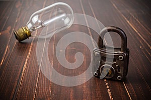 Old retro padlock and light bulb