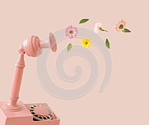 Old retro phone and flowers