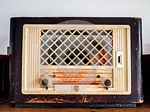 Old retro radio on the table front gradient background