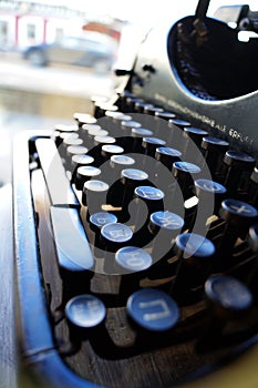 Old retro typewriter at the window