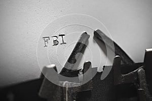 Old typewriter with the written text FBI. photo