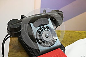 Old retro vintage antique hipster disc black landline phone with