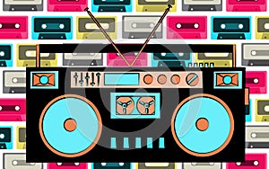 Old retro vintage antique hipster obsolete cassette music audio tape recorder on a background of multi-colored music audio cassett