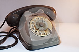 Old retro vintage rotary analogic telephone.