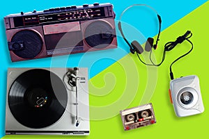 Old retro Vinyl record player or turntable, Portable tape player with radio and cassette tape and Headphone