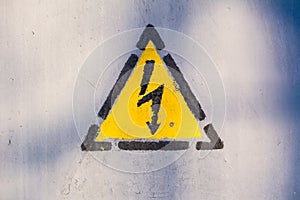 Old risk of electric shock triangle sign