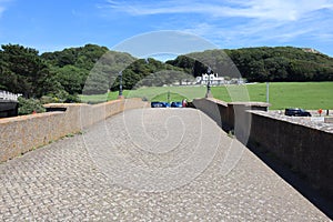 The old road bridge across the River Axe at Axmouth. It was replaced in 1990 and is the oldest standing concrete bridge in England