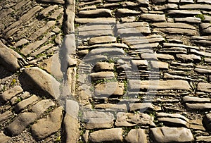 Old road pavement with layed stones