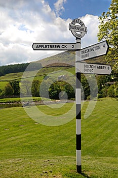 Old road sign in Burnsall
