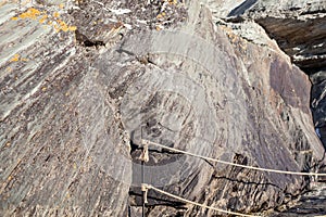 Old rock carvings of an ancient man on rocks in Siberia.