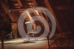 Old rocking chair in rustic vintage style attic. Memories concept