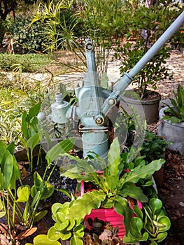The old rocking pump in the outdoor garden