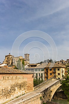 Old roman bridge in the historic city of Estella photo