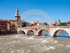 old roman bridge in Verona spans the river Etsch