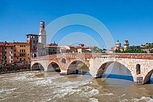 old roman bridge in Verona spans the river Etsch