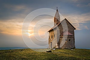 Old Roman Church at Sunset in Drazovce, Slovakia photo