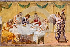 Old roman fresco showing a family supper