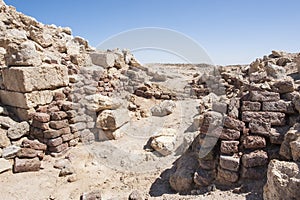 Old roman ruins on desert coastline