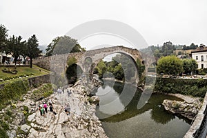 Old Roman stone bridge in Cangas de Onis over the river in Spain