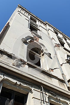 old Romanian building affected by past earthquakes