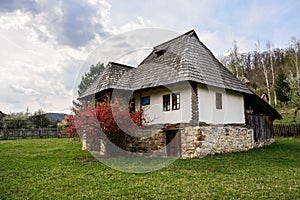 Old romanian peasant house, Village Museum, Valcea, Romania photo