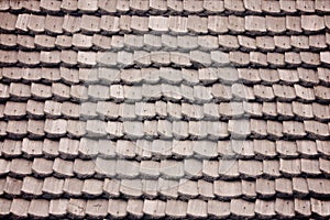 Old roof with wooden shingles. Texture. Close-up