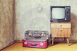 Old room. retro tv and old suitcases