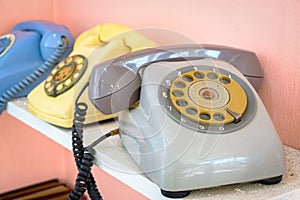Old rotary phone Placed on the shelf