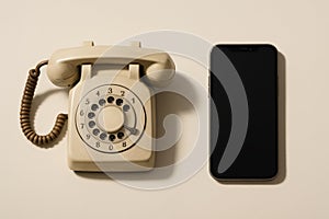 Old rotary phone vs modern smartphone