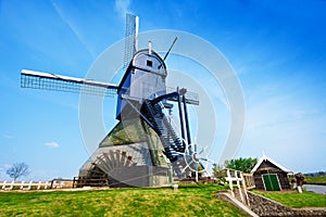 Old rotating water pumping windmill in Holland