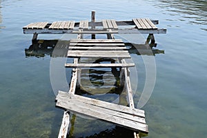 Old rotten boat bridge in a ghost town