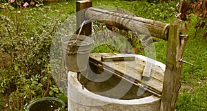 Old rotten water well, rural scenery