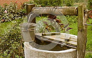 Old rotten water well, rural scenery