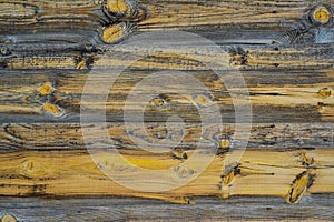 Old rotten wood, boards with knots on an old barn