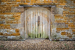 Old rotting wooden double doors