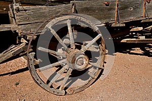 Old rotting wooden wheel and wagon