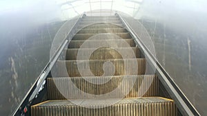 Old rough escalator moving up, full hd video