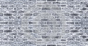 Old rough grey brick wall distressed texture. Grunge textured background