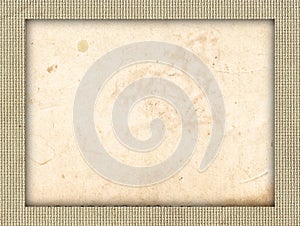 Old rough paper texture with rustic canvas textile background