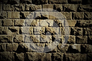 Old rough stone block wall. Black and white image.