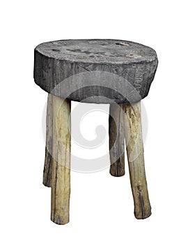 Old round wood stool isolated.