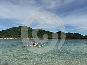 Old rowboat in the beach Gili Kedis