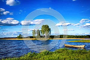 Old rowboat on the lake