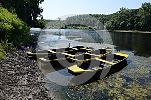 Old rowboat on river