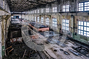 Old ruined abandoned concrete factory interior, aerial view