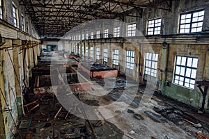 Old ruined abandoned concrete factory interior, aerial view